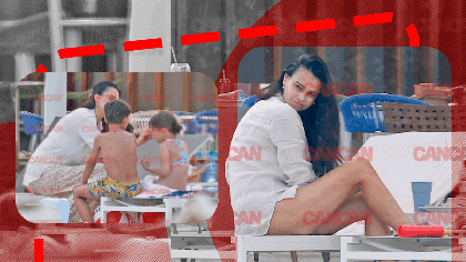 Anca Serea, cu un ochi la copii, cu altul la… Soţia lui Adrian Sînă s-a “ascuns” sub umbreluţă şi a trecut la fapte