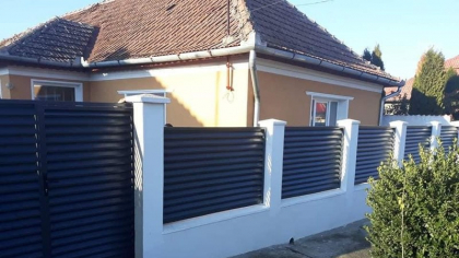 Cum stabilești înălțimea gardului dintre tine și vecinul tău. Ce spune Codul Civil