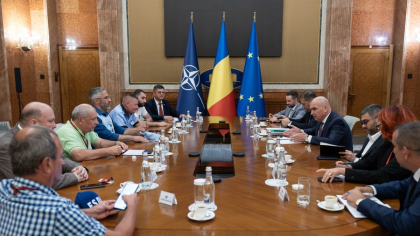 Sindicatele acceptă să amâne protestele după discuțiile cu Bolojan: „Dacă nu luăm măsurile necesare, costurile vor fi mai mari”