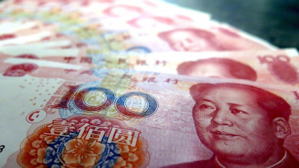 Banca centrală a Chinei reduce două dobânzi-cheie la minime record