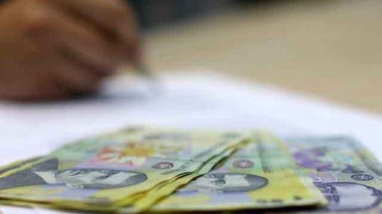 Statul le ia românilor banii de pe card. Suma minimă este de 5.000 de lei