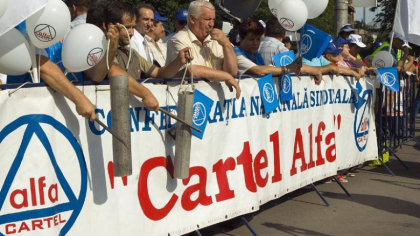 Cartel Alfa înconjoară Parlamentul în semn de protest față de austeritatea mascată