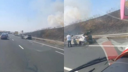 A luat foc o mașină pe Autostrada A2. Traficul este oprit pe sensul către București. Incendiul s-a extins și la vegetația uscată