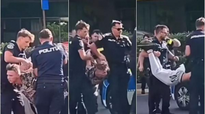 Scandal în centrul Capitalei: un individ a fost legat si luat pe sus de polițiști după ce și-a agresat soția
