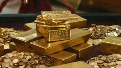 Prețul aurului scade după atingerea unui record istoric